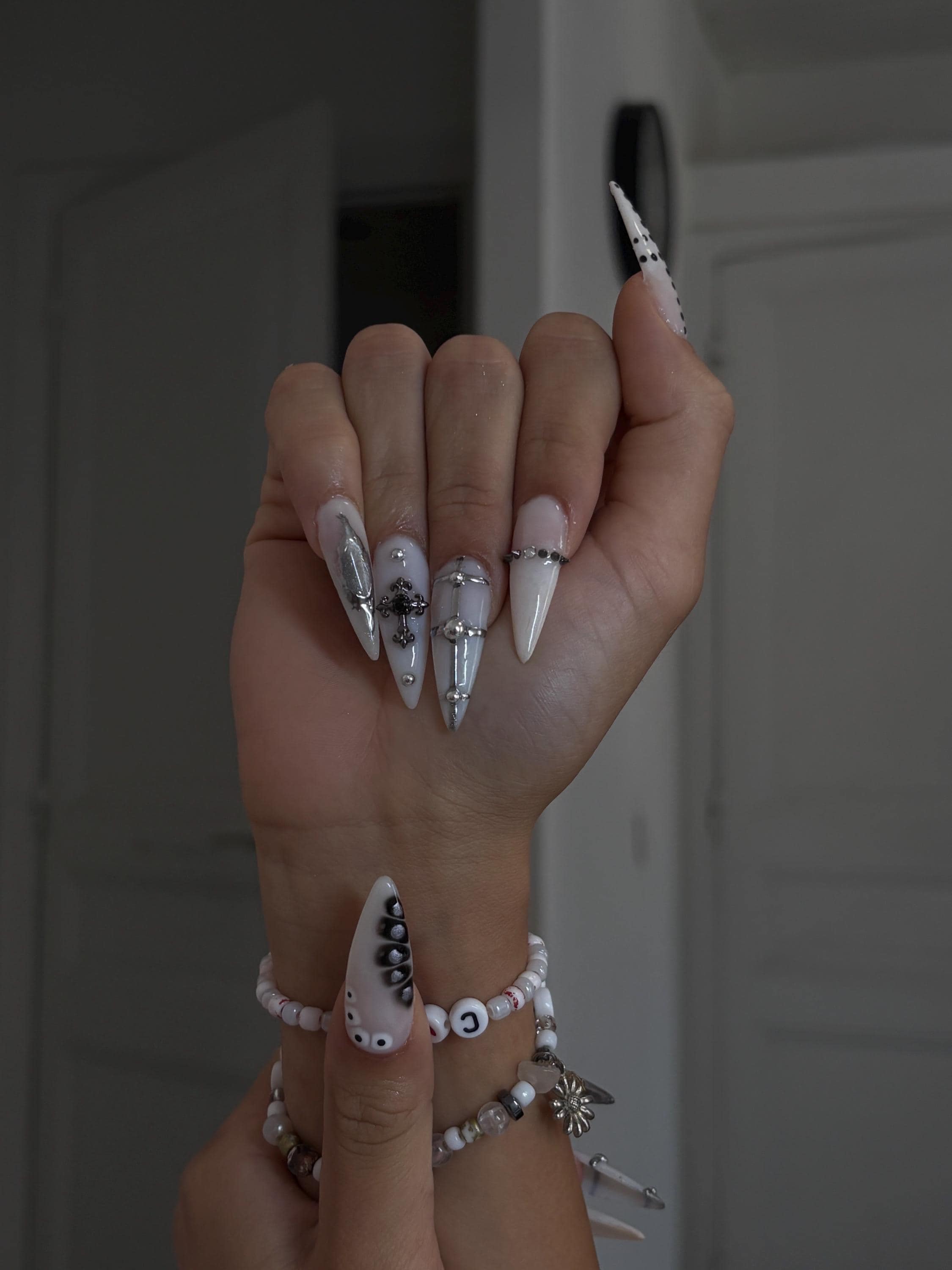 Handmade press-on nail in black and milky white, alternative style