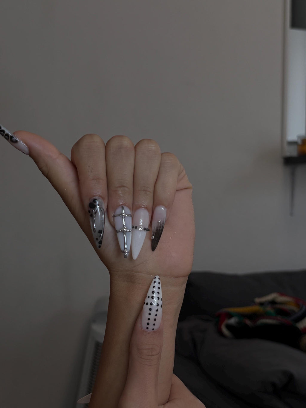 Handmade press-on nail in black and milky white, alternative style