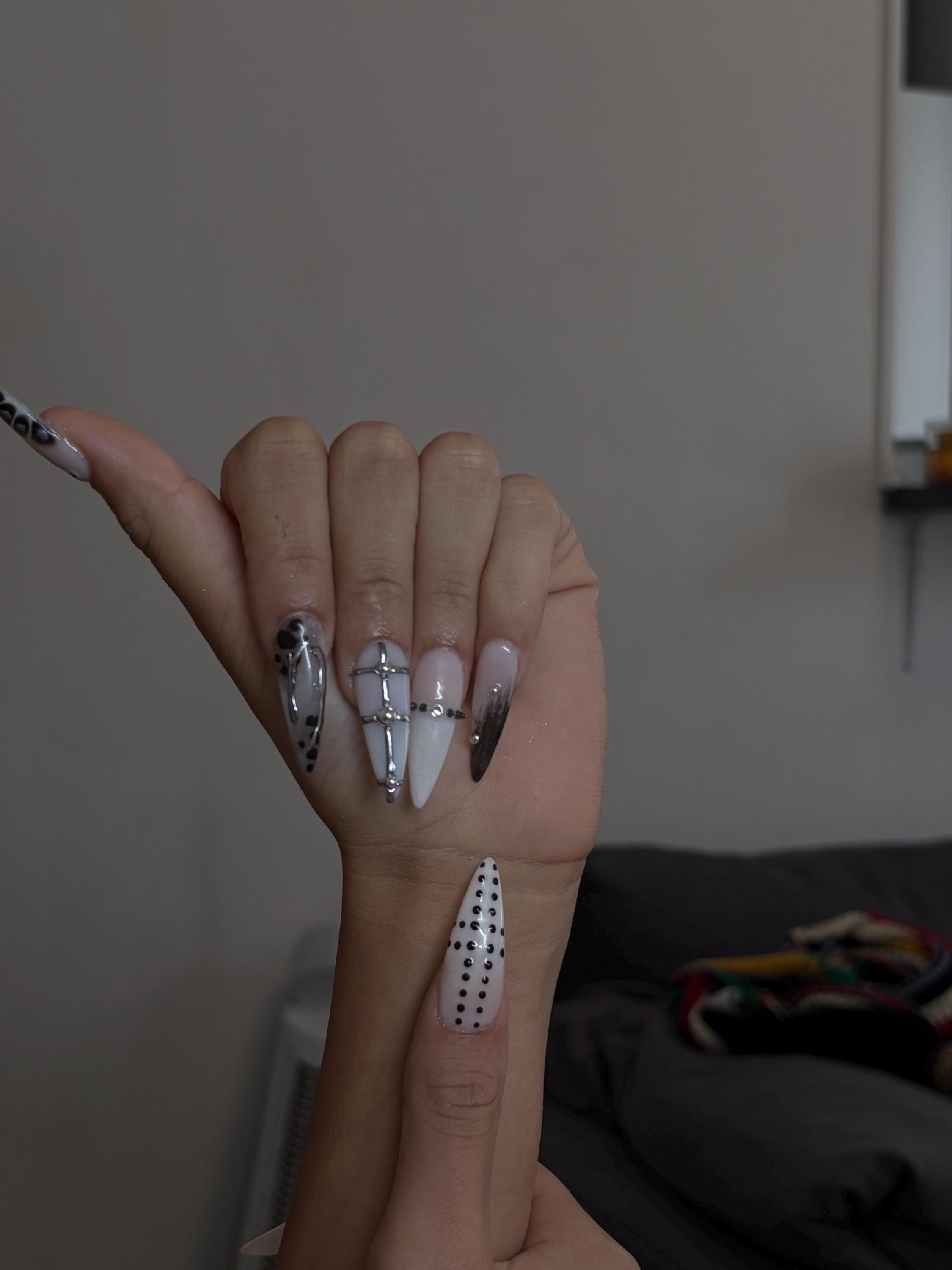 Handmade press-on nail in black and milky white, alternative style