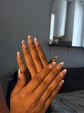 French handmade white press-on nail/ Faux ongles "French" faits main en blanc.