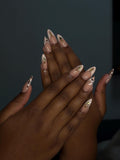 Handmade French press-on nail in white and leopard print with gold details/ Faux ongles "press-on" French faits main en blanc et imprimé léopard avec détails dorés.
